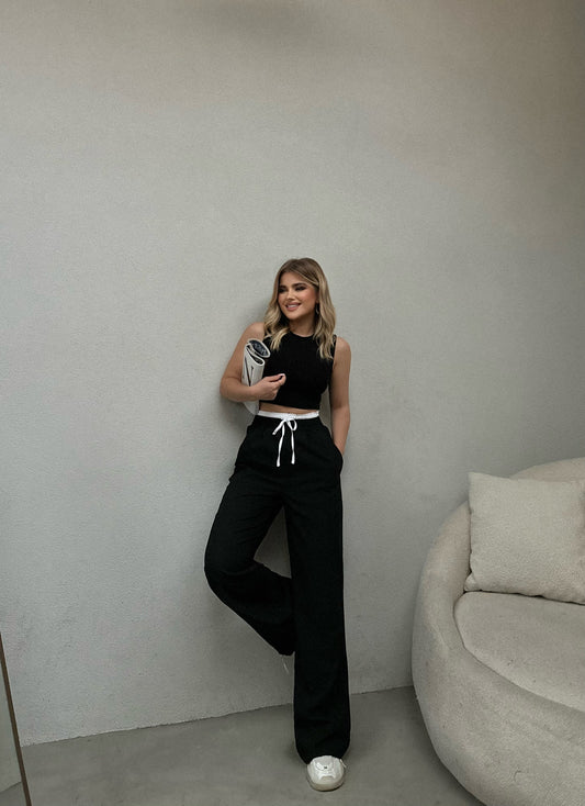 PANTALLONA ME QEMER TE BARDHE DHE RRIP NE BEL